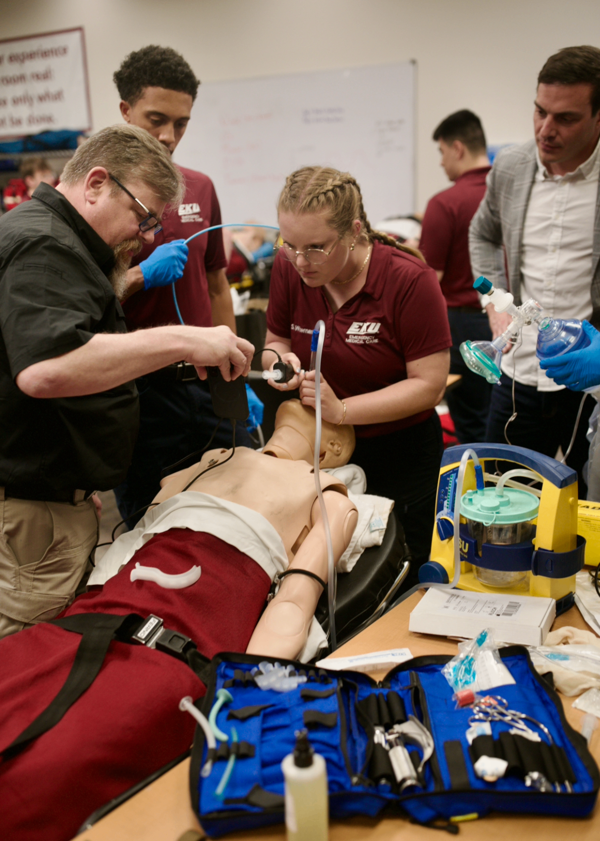 EMS students practicing hands-on intubation with IntuBlade during a skills session