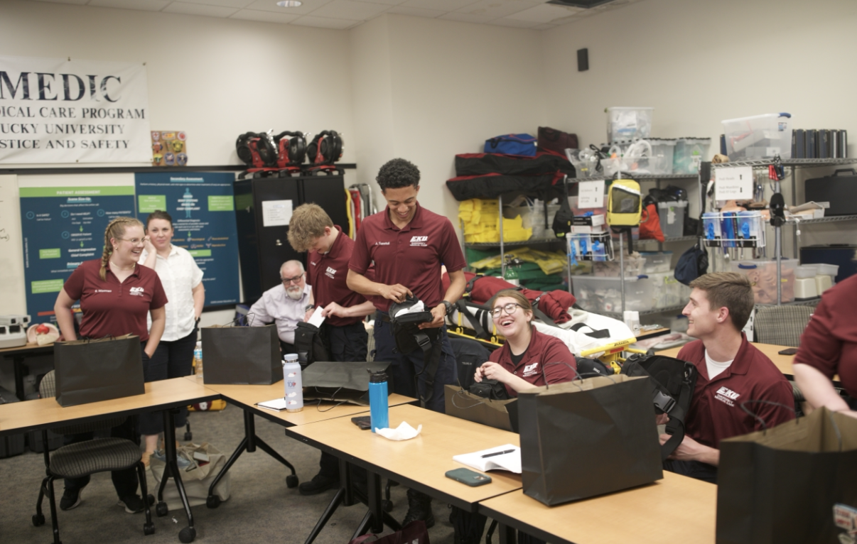 EKU EMC paramedic students surprised with personal IntuBlade devices in branded bags during the Educator Support Program donation ceremony